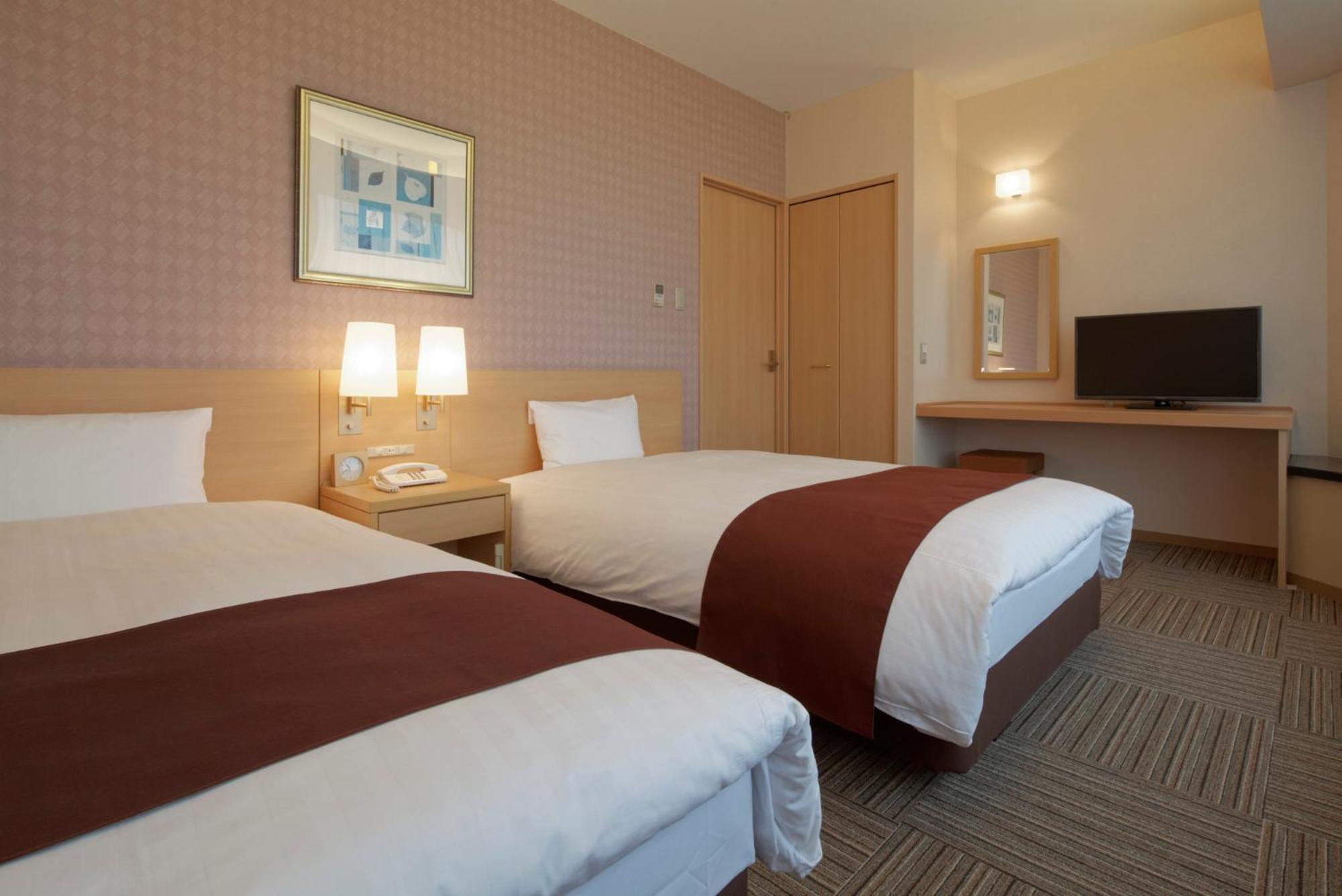 Kanazawa Tokyu Hotel Luaran gambar A typical room at the hotel